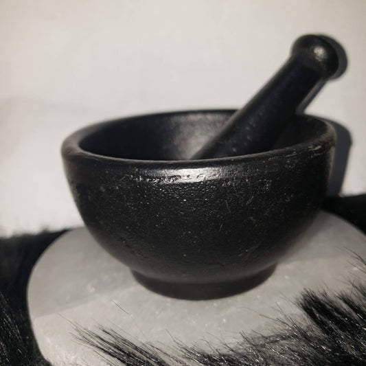 Cast iron mortar and pestal- herbs, cauldron,  alter, spell work