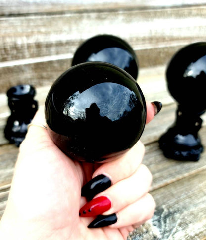 1 Black obsidian Sphere- grounding,  protection,  calming, root chakra, stand also available